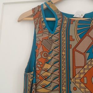 Akemi + Kin anthropologie dress Orange turquoise print for day and night.
